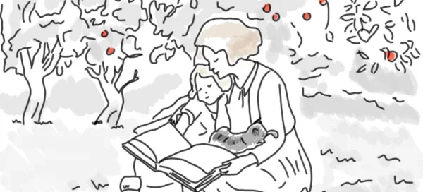 Die Mutter liest dem Kind das Buch vor.